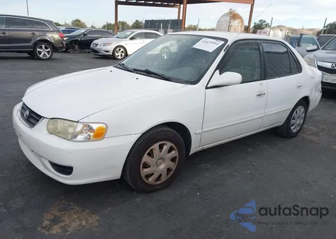 2001 Toyota Corolla Le z USA, uszkodzony, nr VIN 1NXBR12E11Z526950